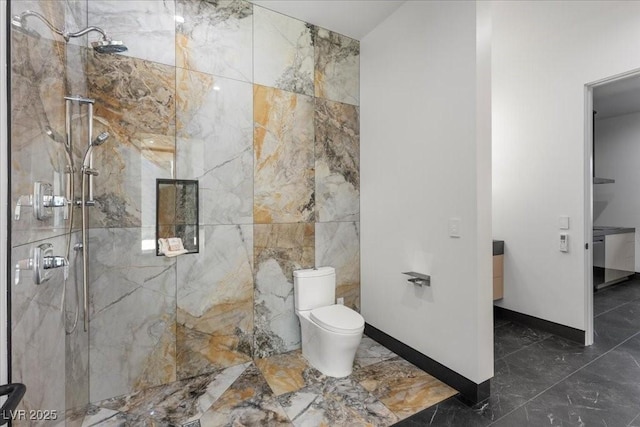 38 Skybird Ct, Las Vegas, NV 89135 - full bath with a marble finish shower, marble tiled flooring, toilet, and tile walls