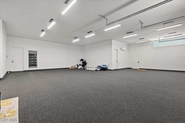 38 Skybird Ct, Las Vegas, NV 89135 - garage featuring baseboards