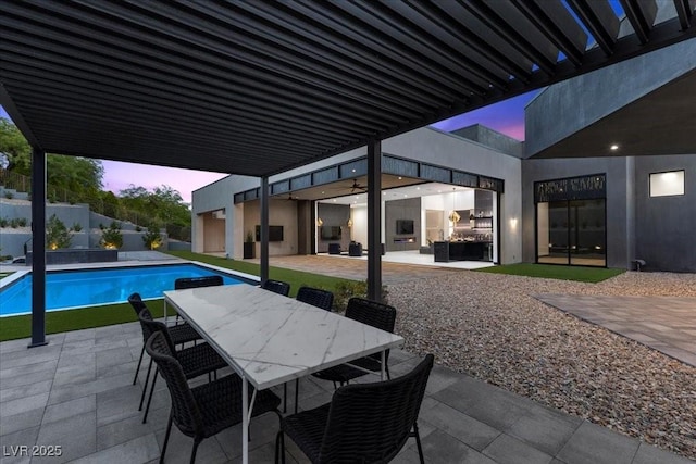 38 Skybird Ct, Las Vegas, NV 89135 - patio terrace at dusk featuring a patio area and outdoor dining area