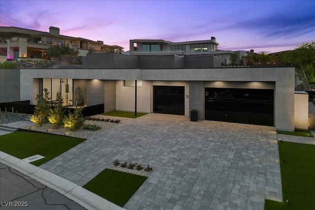 38 Skybird Ct, Las Vegas, NV 89135 - contemporary home with decorative driveway and an attached garage