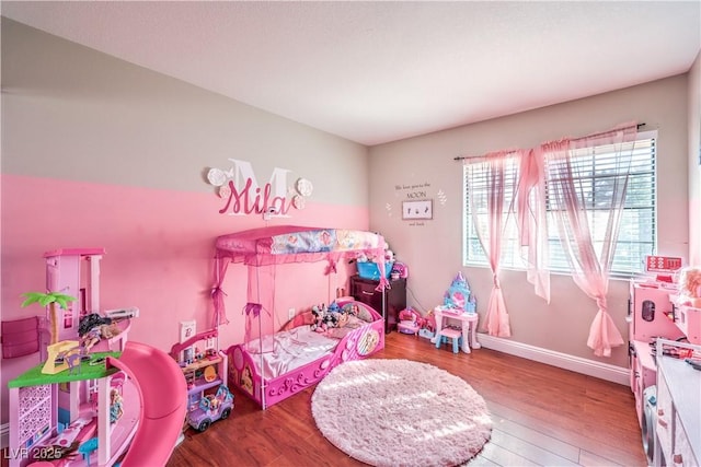 8932 Beach Front Dr, Las Vegas, NV 89117 - bedroom with wood finished floors and baseboards