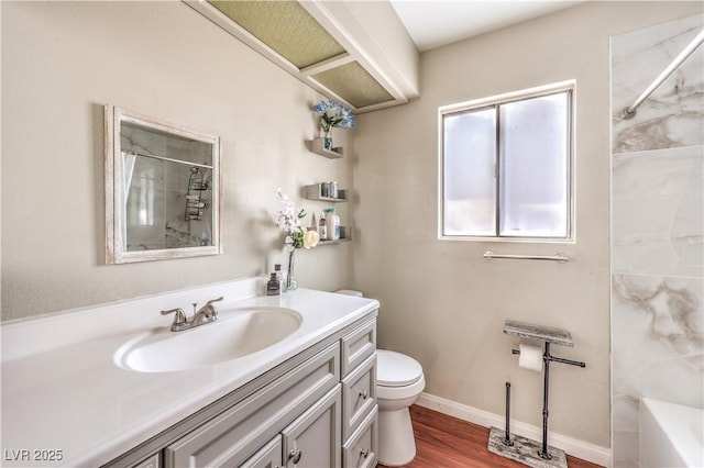 8932 Beach Front Dr, Las Vegas, NV 89117 - full bathroom with vanity, toilet, wood finished floors, and  shower combination