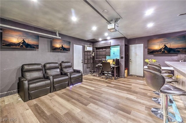 8932 Beach Front Dr, Las Vegas, NV 89117 - cinema room with recessed lighting, wood finished floors, baseboards, and an AC wall unit