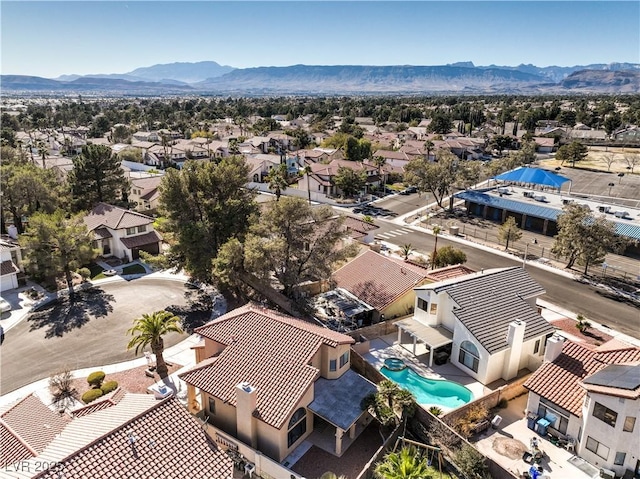8932 Beach Front Dr, Las Vegas, NV 89117 - aerial view of residential area with a mountain backdrop and a pool