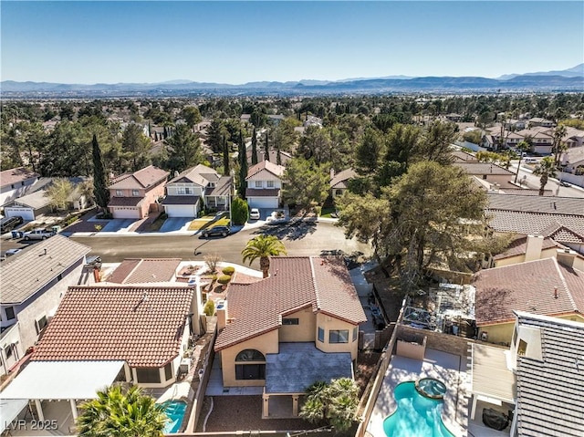 8932 Beach Front Dr, Las Vegas, NV 89117 - aerial perspective of suburban area with a mountain backdrop and a pool