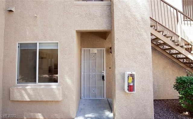 2110 Los Feliz St Unit 1034, Las Vegas, NV 89156 - view of exterior entry with stucco siding