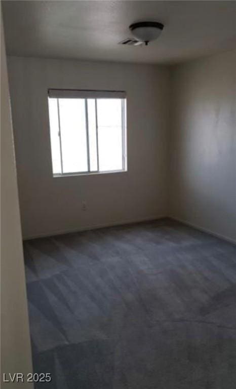 3644 Starlight Evening St, Las Vegas, NV 89129 - spare room with carpet flooring, healthy amount of natural light, and baseboards