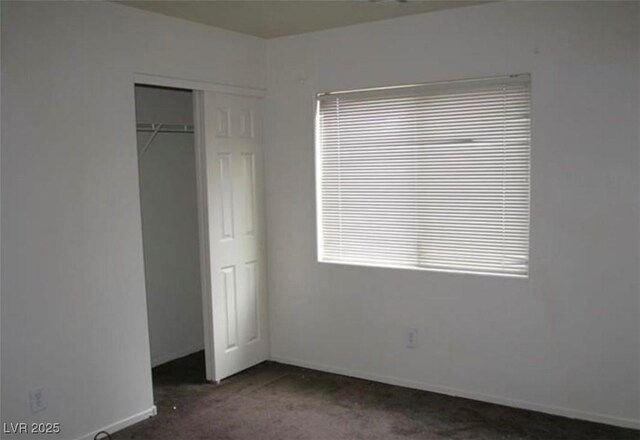 9402 Crimson Sky St, Las Vegas, NV 89178 - unfurnished bedroom with carpet floors, a closet, and baseboards