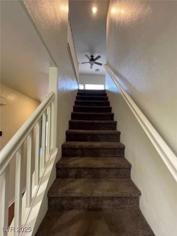 9402 Crimson Sky St, Las Vegas, NV 89178 - stairway with ceiling fan