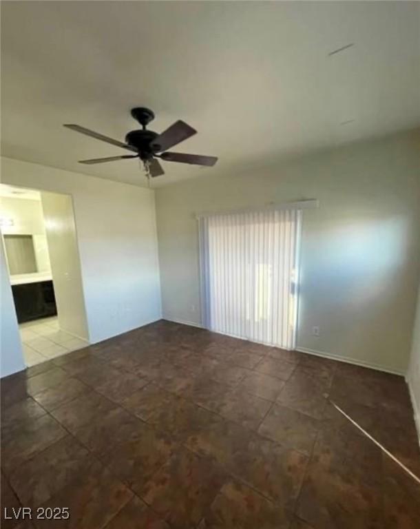 9402 Crimson Sky St, Las Vegas, NV 89178 - unfurnished room featuring ceiling fan and baseboards