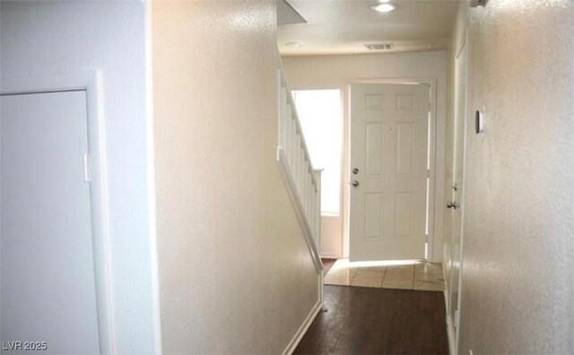 9402 Crimson Sky St, Las Vegas, NV 89178 - hall with stairway, wood finished floors, and baseboards