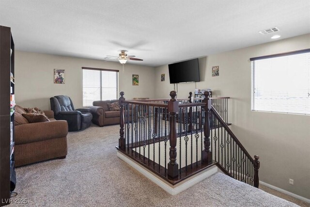 8925 Kenzie Cove St, Las Vegas, NV 89131 - living room featuring carpet flooring, a ceiling fan, and baseboards