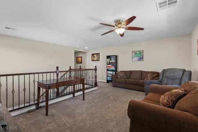 8925 Kenzie Cove St, Las Vegas, NV 89131 - carpeted living room with a ceiling fan and baseboards