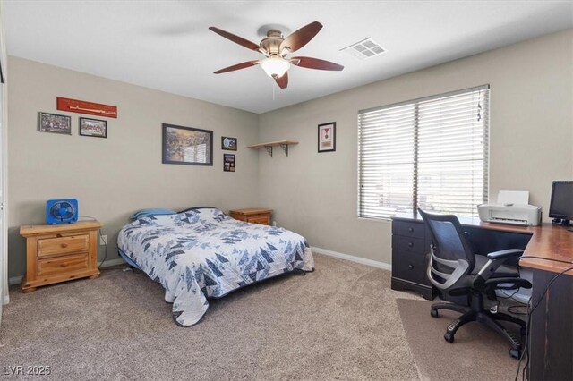 8925 Kenzie Cove St, Las Vegas, NV 89131 - carpeted bedroom featuring baseboards, a desk, and a ceiling fan