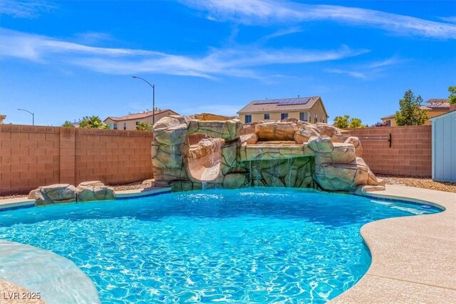 8925 Kenzie Cove St, Las Vegas, NV 89131 - view of swimming pool featuring a fenced backyard