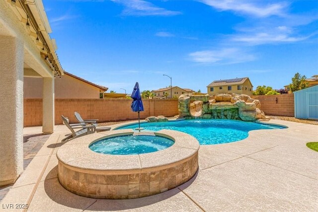 8925 Kenzie Cove St, Las Vegas, NV 89131 - view of pool with a fenced backyard, a patio area, and a pool with connected hot tub