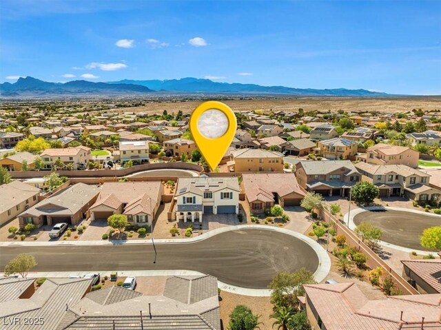 8925 Kenzie Cove St, Las Vegas, NV 89131 - aerial perspective of suburban area with a mountainous background