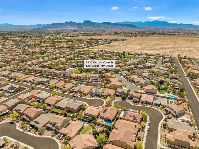 8925 Kenzie Cove St, Las Vegas, NV 89131 - aerial view of property's location with a mountainous background and nearby suburban area