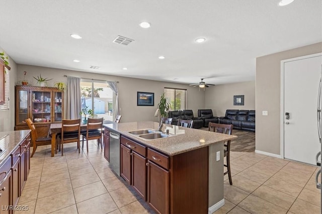8925 Kenzie Cove St, Las Vegas, NV 89131 - kitchen with dishwasher, healthy amount of natural light, recessed lighting, light tile patterned floors, and ceiling fan
