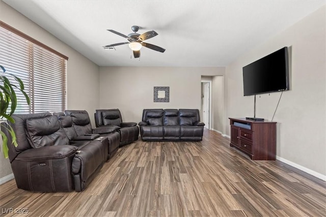 8925 Kenzie Cove St, Las Vegas, NV 89131 - living area featuring wood finished floors, ceiling fan, and baseboards