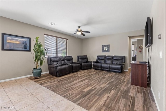 8925 Kenzie Cove St, Las Vegas, NV 89131 - living area featuring dark wood-type flooring, ceiling fan, and baseboards