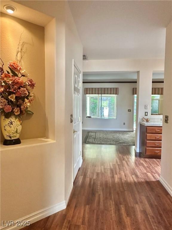 2138 Grand Traverse St, Henderson, NV 89052 - hallway with wood finished floors and baseboards