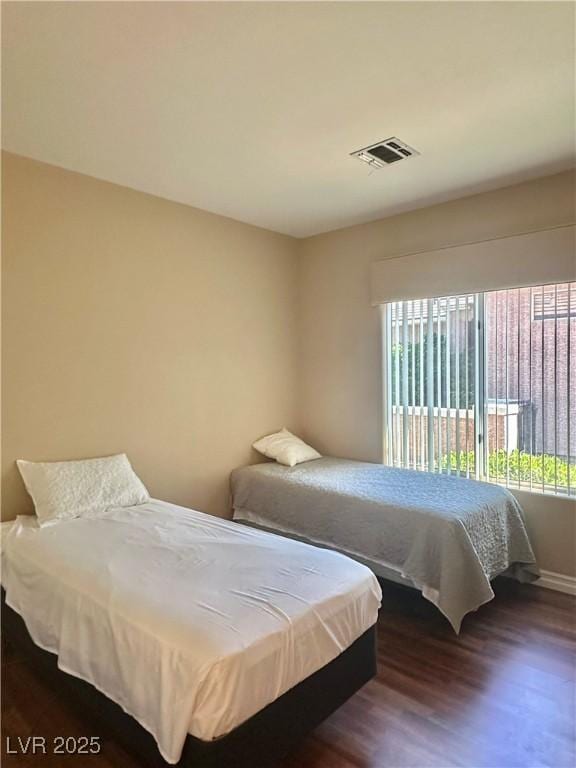 2138 Grand Traverse St, Henderson, NV 89052 - bedroom with wood finished floors and baseboards