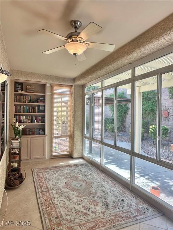 2138 Grand Traverse St, Henderson, NV 89052 - doorway with light tile patterned floors and a ceiling fan