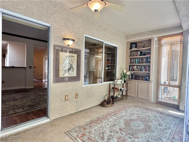 2138 Grand Traverse St, Henderson, NV 89052 - interior space with tile patterned flooring, a ceiling fan, and built in shelves