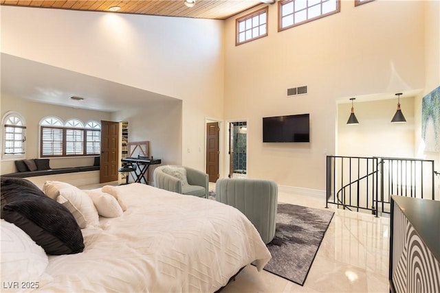 2845 Queens Courtyard Dr, Las Vegas, NV 89109 - bedroom with a high ceiling, wooden ceiling, and baseboards