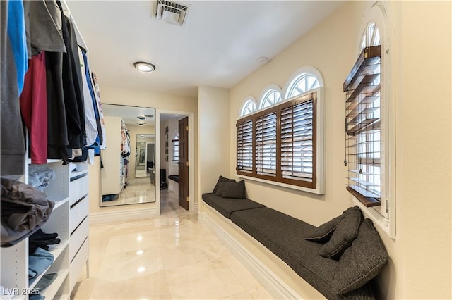 2845 Queens Courtyard Dr, Las Vegas, NV 89109 - hall featuring healthy amount of natural light and marble finish flooring