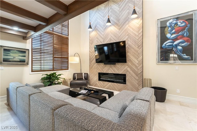 2845 Queens Courtyard Dr, Las Vegas, NV 89109 - living room featuring baseboards, a large fireplace, beam ceiling, and marble finish floors