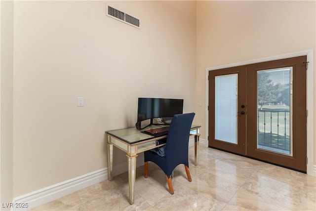 2845 Queens Courtyard Dr, Las Vegas, NV 89109 - office space featuring french doors, baseboards, a towering ceiling, and marble finish floors