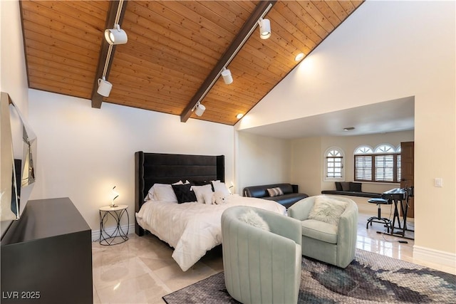 2845 Queens Courtyard Dr, Las Vegas, NV 89109 - bedroom with track lighting, wooden ceiling, baseboards, and high vaulted ceiling