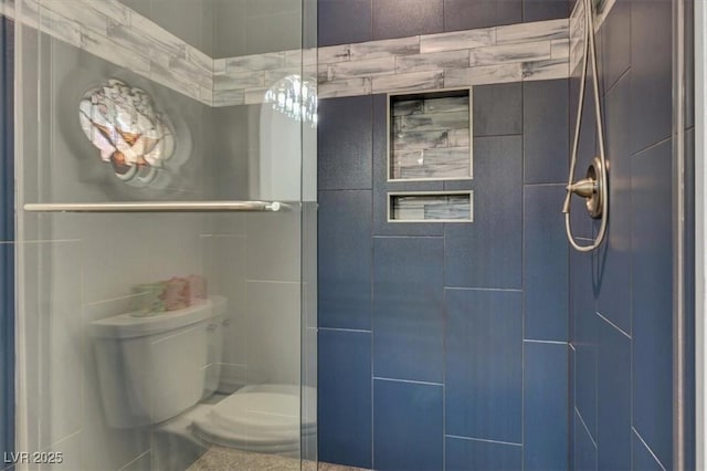 1813 Skyline Dr, Las Vegas, NV 89117 - bathroom featuring a shower stall and toilet