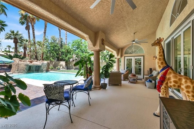 1813 Skyline Dr, Las Vegas, NV 89117 - view of patio featuring a ceiling fan, french doors, and an outdoor pool