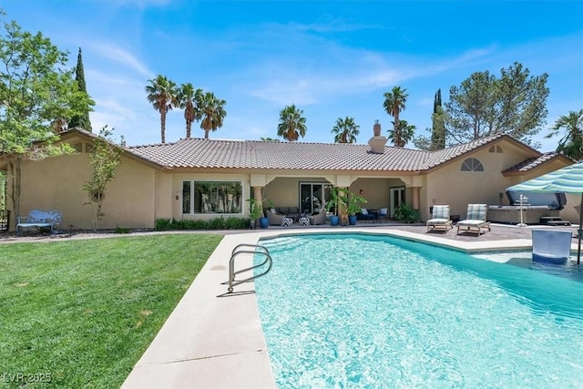 1813 Skyline Dr, Las Vegas, NV 89117 - rear view of property featuring a patio, an outdoor pool, a lawn, and stucco siding