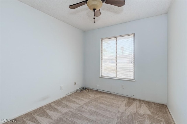 4916 Carmichael Ave, Las Vegas, NV 89110 - empty room featuring light carpet, ceiling fan, and a textured ceiling
