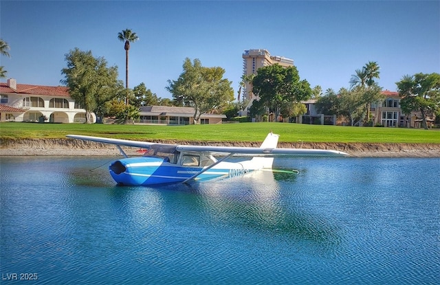 940 Vegas Valley Dr, Las Vegas, NV 89109 - dock area with a yard and a water view