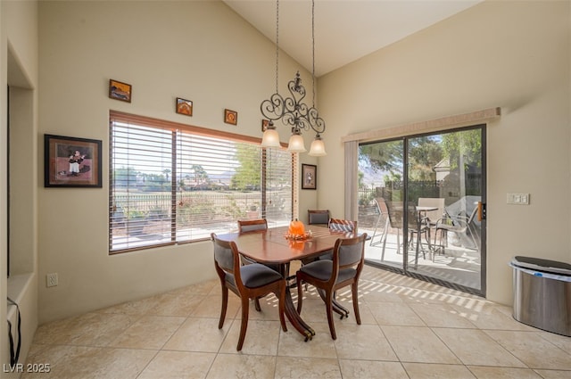 1441 Palm Dr, Laughlin, NV 89029 - dining space featuring high vaulted ceiling and light tile patterned flooring