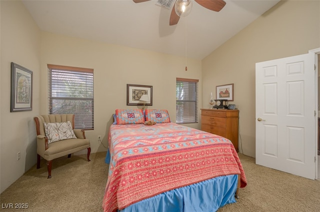 1441 Palm Dr, Laughlin, NV 89029 - bedroom with light colored carpet, multiple windows, a ceiling fan, and high vaulted ceiling