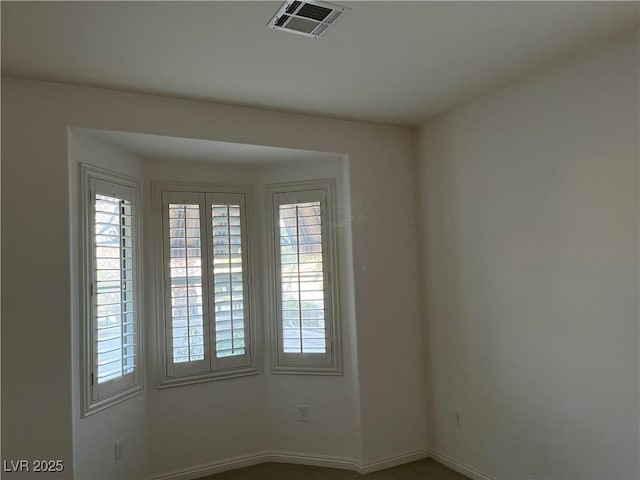 5049 Alfingo St, Las Vegas, NV 89135 - spare room featuring plenty of natural light and baseboards