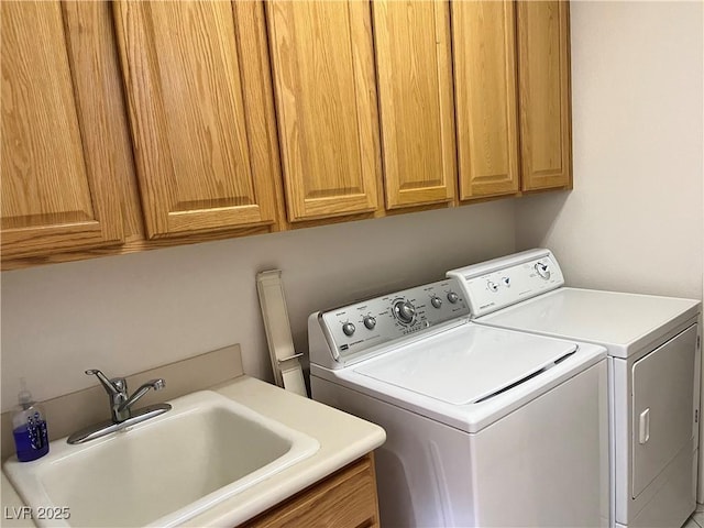 5049 Alfingo St, Las Vegas, NV 89135 - washroom featuring washing machine and clothes dryer and cabinet space