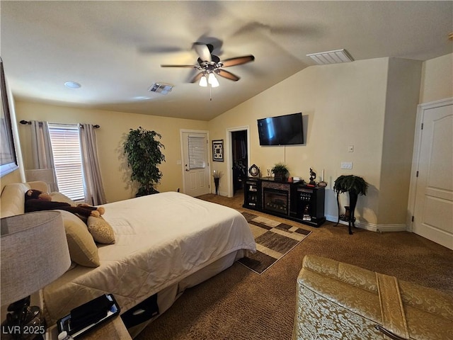 2691 Benton Cove St, Laughlin, NV 89029 - carpeted bedroom featuring vaulted ceiling, a ceiling fan, and baseboards