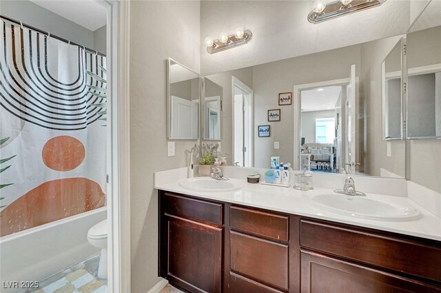 full bathroom with double vanity, toilet, and shower / tub combo