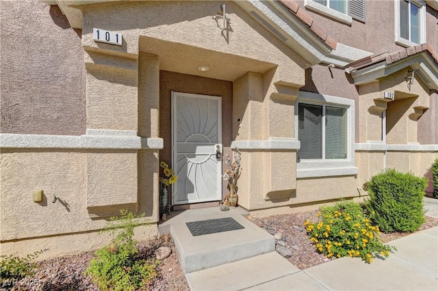 5552 Dueces Wild Ct Unit 101, Las Vegas, NV 89122 - property entrance with stucco siding