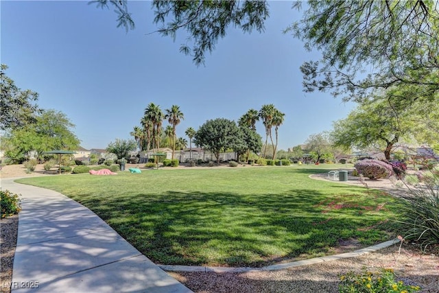5552 Dueces Wild Ct Unit 101, Las Vegas, NV 89122 - view of property's community with a yard