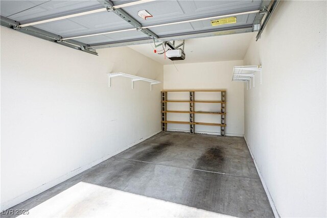 7143 S Durango Dr Unit 202, Las Vegas, NV 89113 - garage featuring a garage door opener