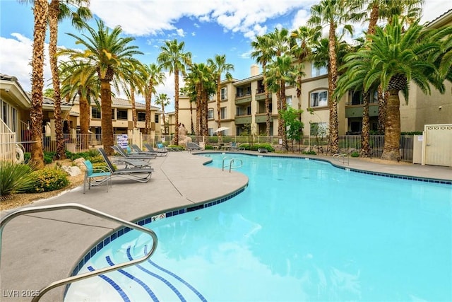 7143 S Durango Dr Unit 202, Las Vegas, NV 89113 - community pool featuring a patio area