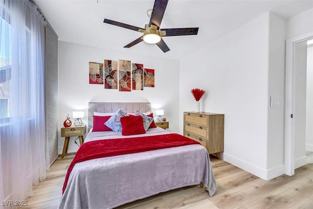 9078 Hilverson Ave, Las Vegas, NV 89148 - bedroom featuring wood finished floors, baseboards, and ceiling fan
